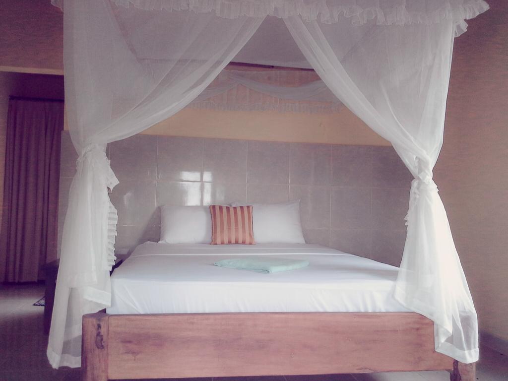 Rumahku Homestay Amed Cameră foto